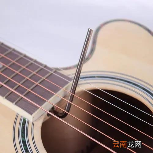琴弦弦距高该如何调 吉他弦距太高怎么调低