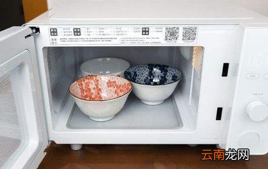 微波炉加热可以用保鲜膜吗 微波炉可以当烤箱用吗
